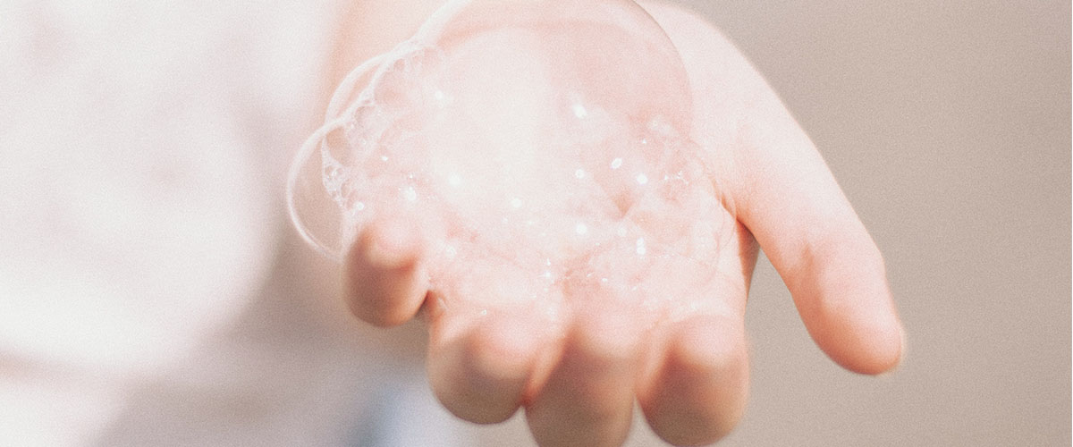 hand holding bubbles 