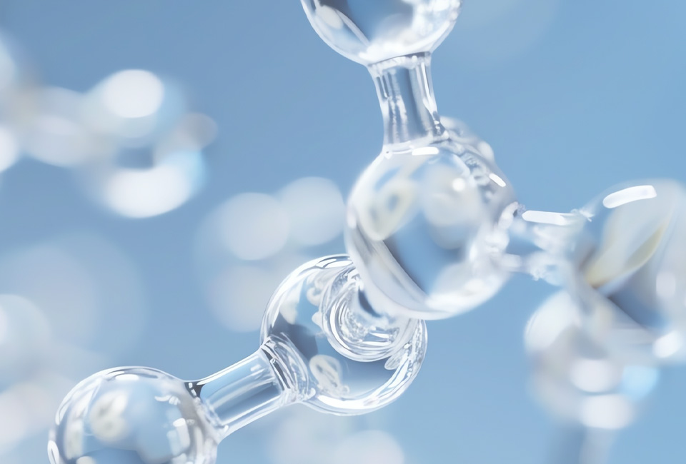 Close-up 3D render of a clear, glass-like molecular chain against a soft blue background.